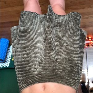 Short green suede skirt